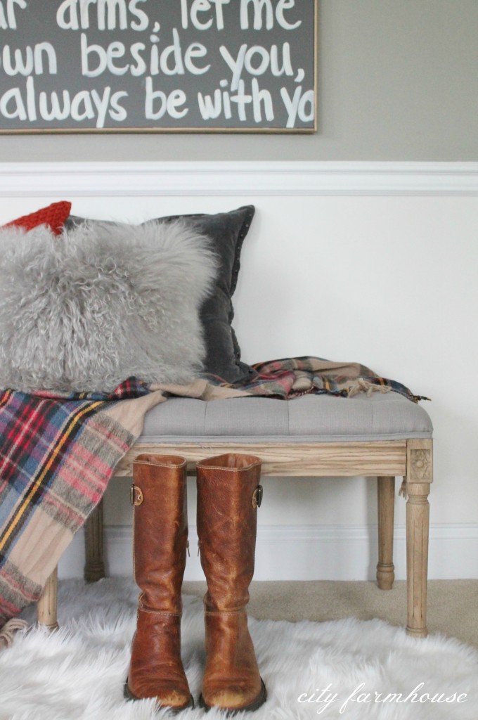 Cozy bench layered with wool throw & soft textured pillows