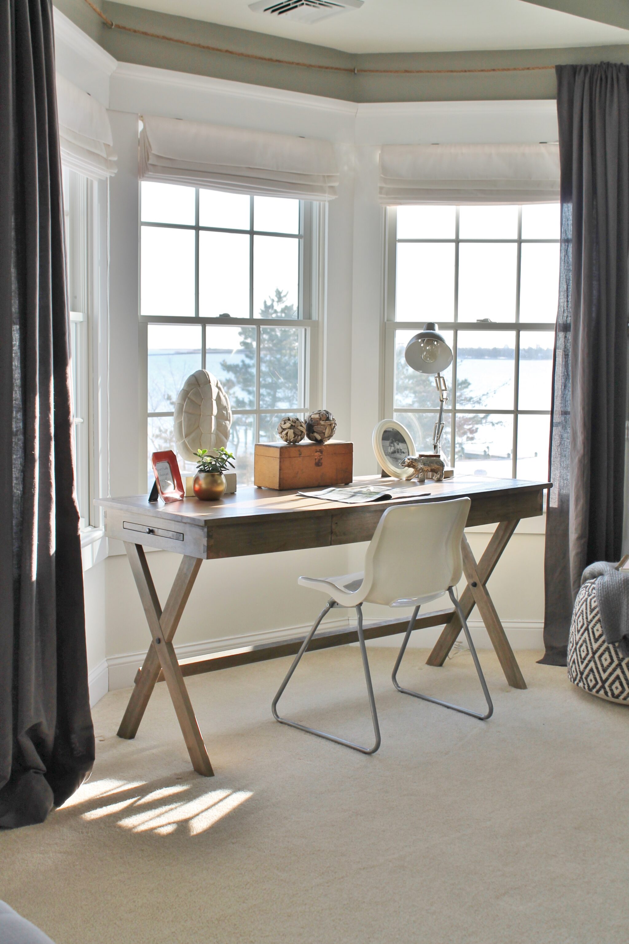 Desk in front of store window bedroom