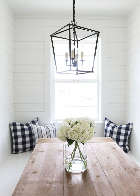 Farmhouse table with lantern, buffalo check and shiplap walls - Studio McGee