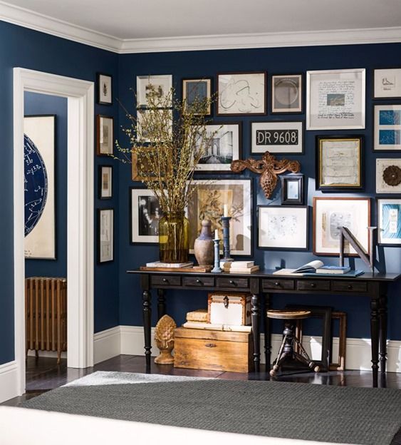 Pottery Barn’s partnership with Sherwin Williams Naval blue as the backdrop to this well curated wall gallery, it’s navy blue perfect