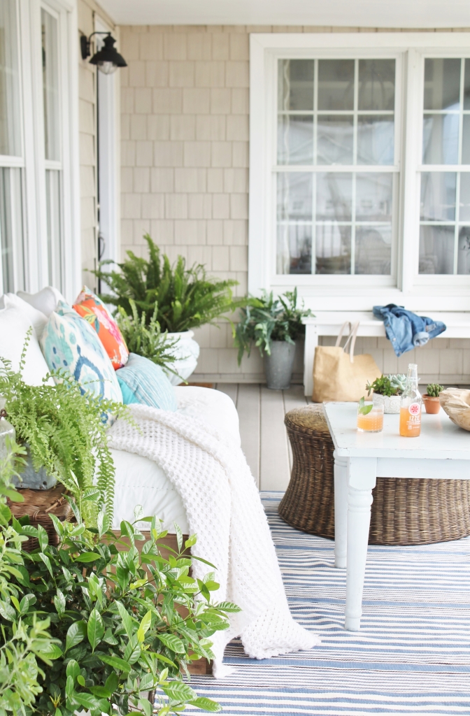 Front Porch Makeover, Dash & Albert Striped Rug and Rattan Ottoman