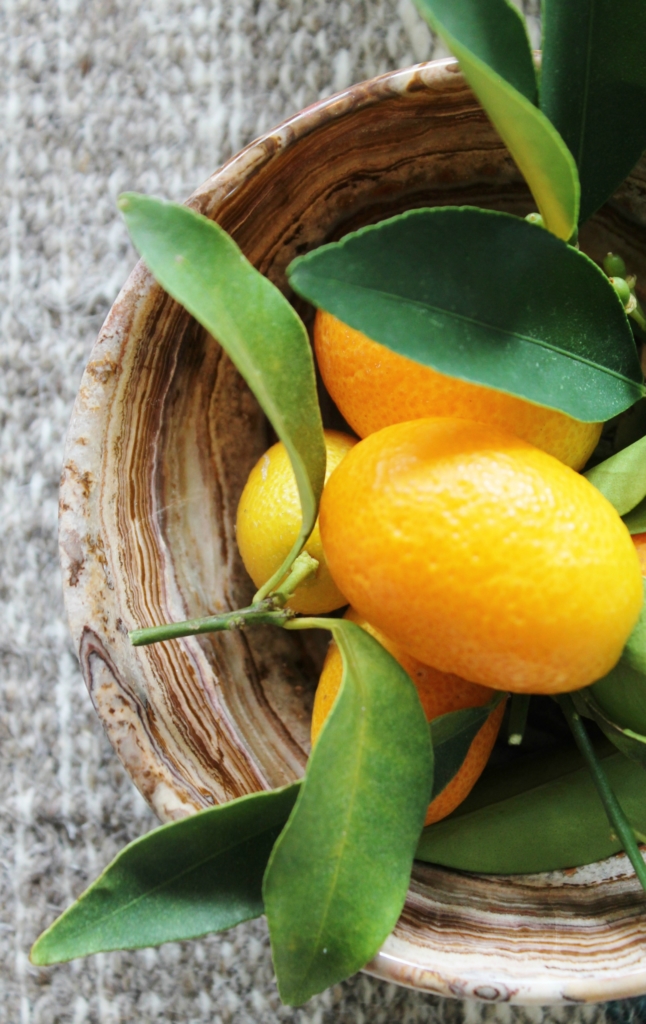 marble bowl filled with kumquats