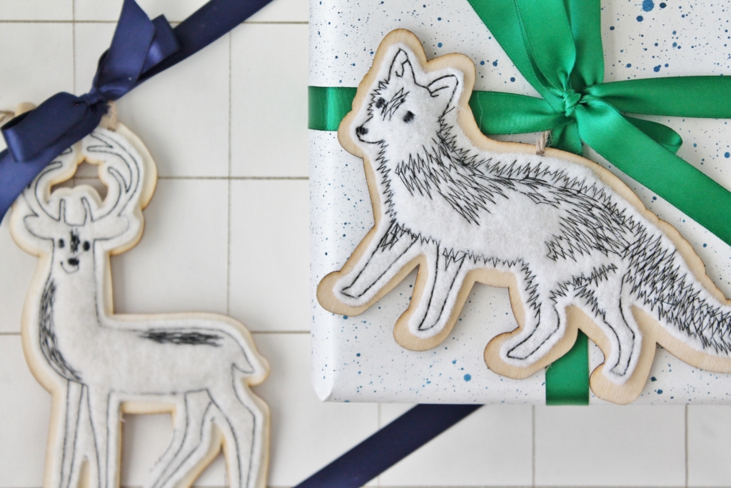 Ikea hack wrapping paper using watercolors + a sharpie. Oh and cute fun ornaments from Target