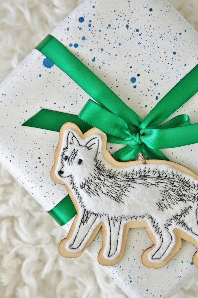 Ikea hack wrapping paper using watercolors + a sharpie. Oh and cute fun ornaments from Target