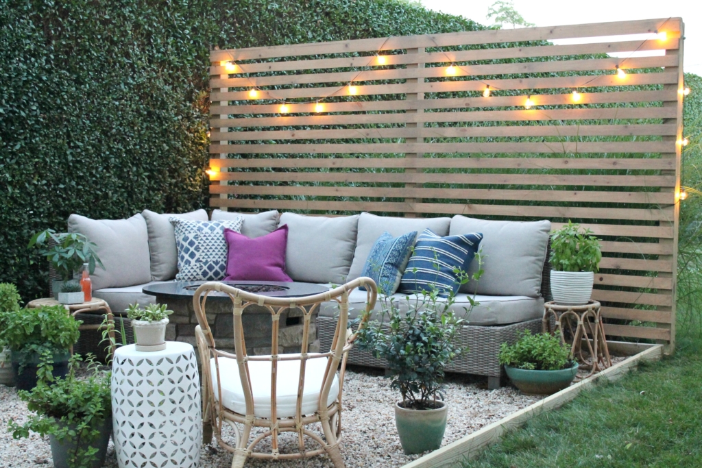 Outdoor Privacy Screen With Sherwin-Williams. DIY Pea Gravel Patio. Painted Dining Table With Wicker Chairs. Modern Rustic Privacy Screen With Baja Beige Super Deck Stain. Outdoor DIY Kitchen. Outdoor Sectional With Firepit