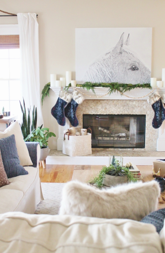 City Farmhouse Simple Sophisticated Scandinavian Christmas House Tour-Horse Print, Nordic Fur Stockings, Indigo Pillows, Leather, Knit, Deer print, Felt Basket, Mid Century Modern Chair & Linen Ikea Sectional