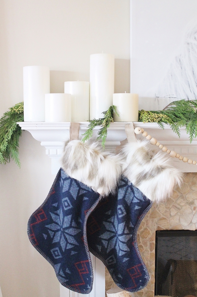 City Farmhouse Simple Sophisticated Scandinavian Christmas House Tour-Horse Print, Nordic Fur Stockings, Indigo Pillows, Leather, Knit, Deer print, Felt Basket, Mid Century Modern Chair & Linen Ikea Sectional