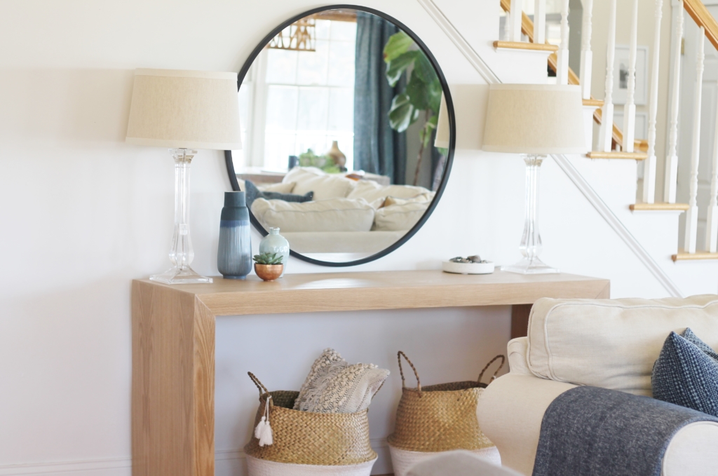 Waterfall Console Table With Round Mirror Reveal, Minwax Polycrylic Finish. Family Room Makeover with White Walls. Custom Made Console Table in White Oak-City Farmhouse