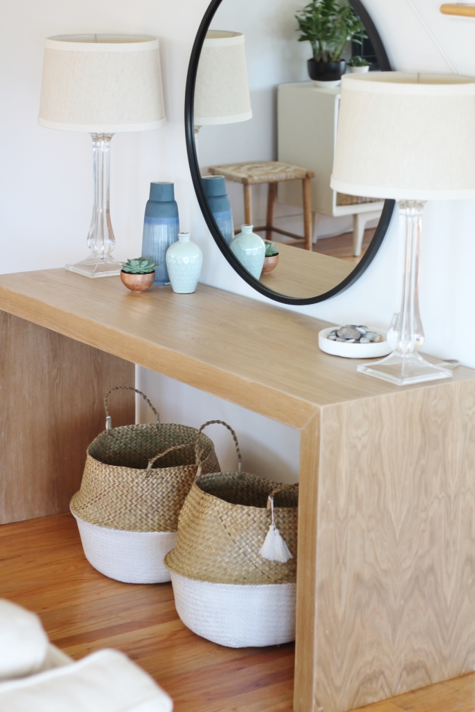 Waterfall Console Table With Round Mirror Reveal, Minwax Polycrylic Finish. Family Room Makeover with White Walls. Custom Made Console Table in White Oak-City Farmhouse