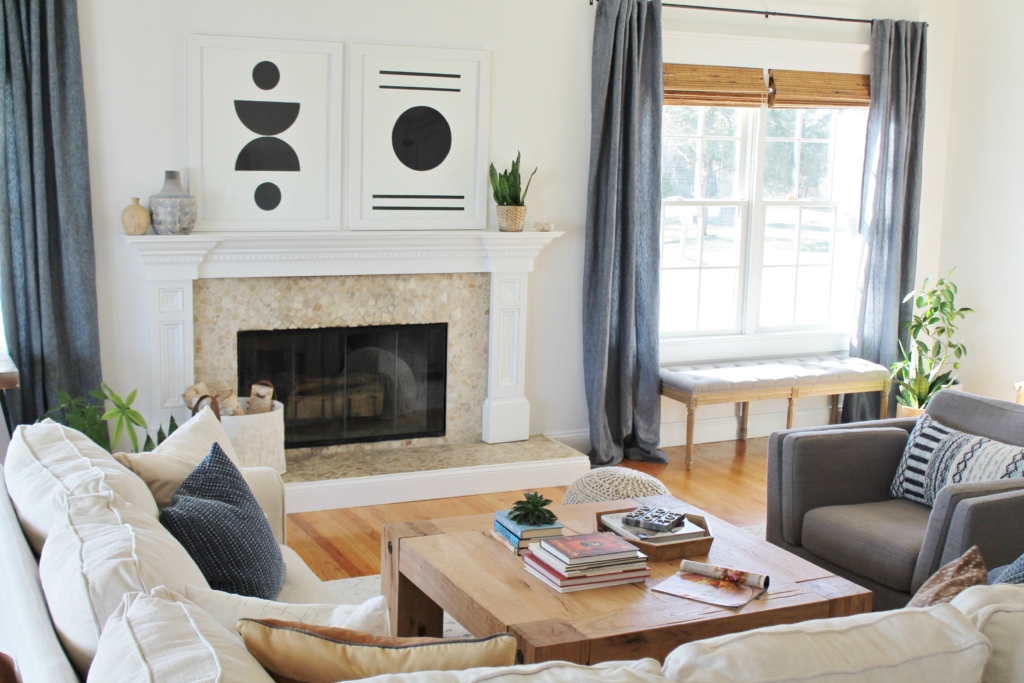 Details On My White Family Room: Paint, Curtains, Art + More. Sherwin-Williams Snowbound. Abstract Black & White Art. Linen Sectional Ikea. Waterfall Table. Indigo Curtains. City Farmhouse