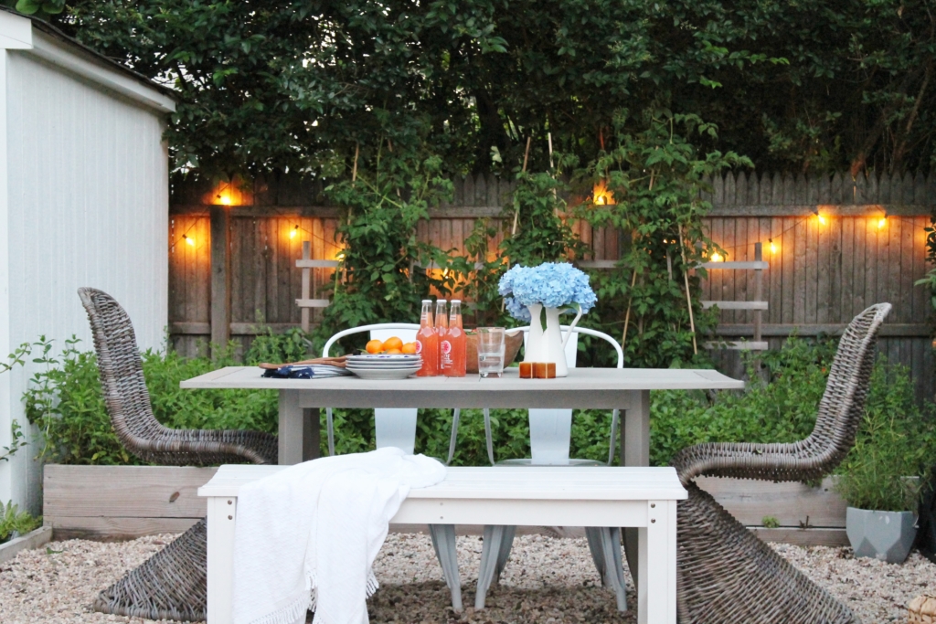 Nantucket Inspired Backyard With Modern Wicker Chairs