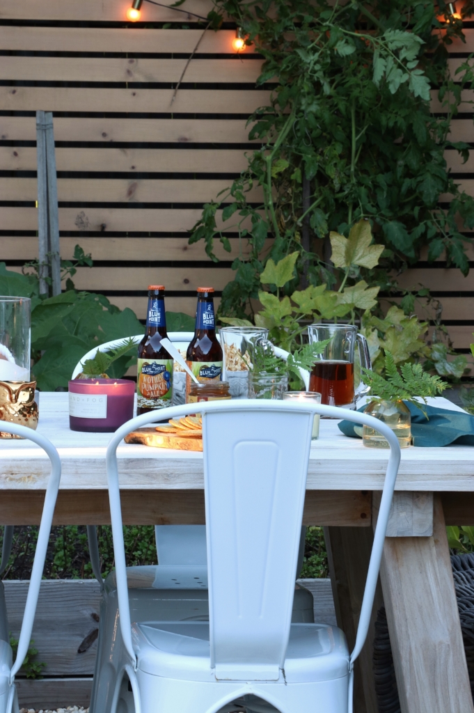 Simple Fall Outdoor Tablescape Using Jewel Tones + Ferns