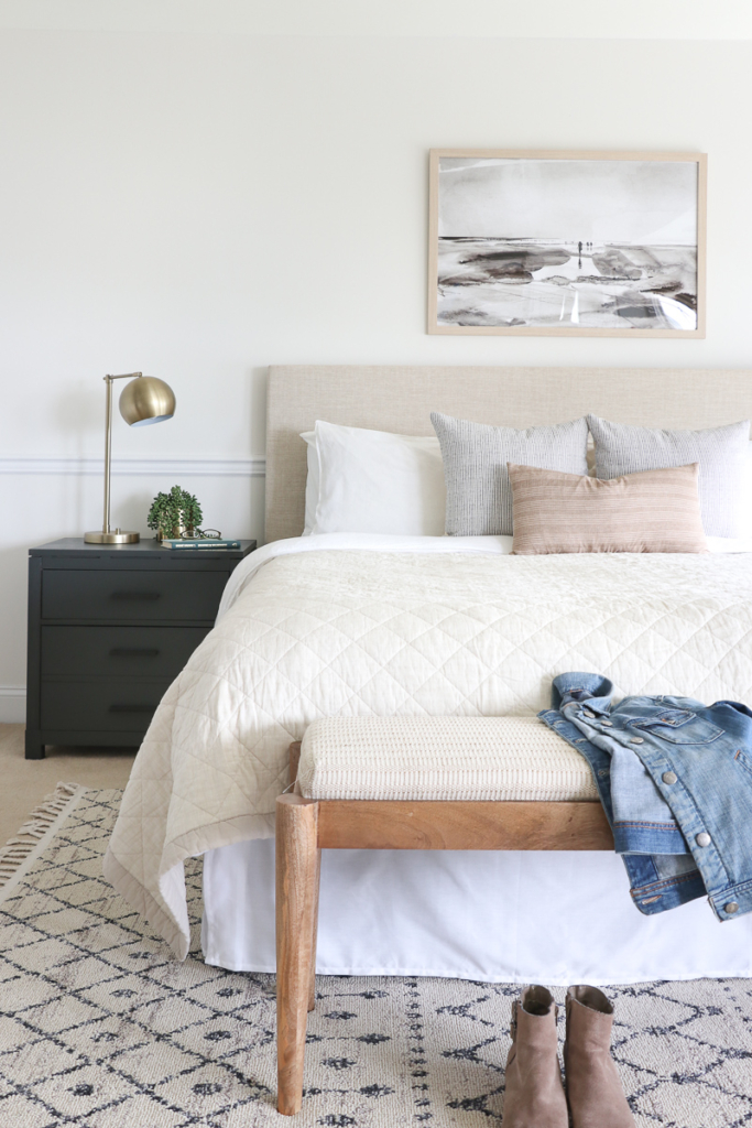 Modern Hamptons Bedroom City Farmhouse. White walls, woven bench, green sidetables