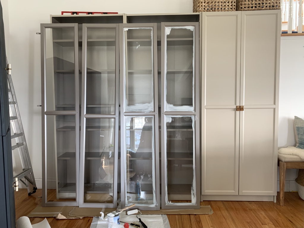 Ikea Billy Bookcase with doors for designer handbag storage