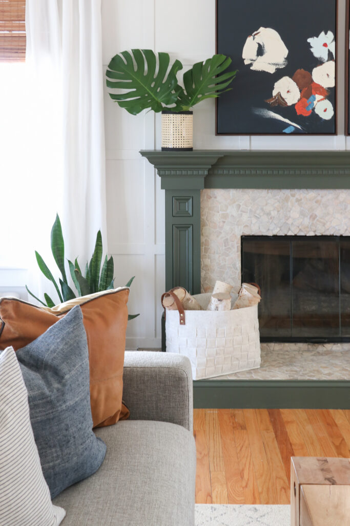 DIY Cane Vase + Mantle Restyling. Green painted mantle, Minted Art with a tropical vibe. City Farmhouse BHG HGTV magazine. DIY Pottery Vases. Board and Batten Wall.