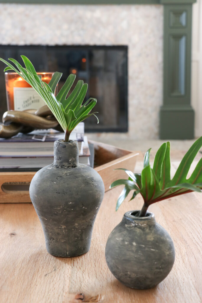 DIY Cane Vase + Mantle Restyling. Green painted mantle, Minted Art with a tropical vibe. City Farmhouse BHG HGTV magazine. DIY Pottery Vases.