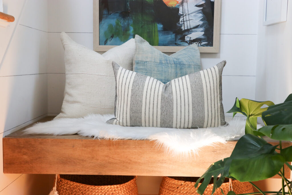 Modern Coastal Summer Nook With New Abstract Painting. Pillows from City Farmhouse and Co,