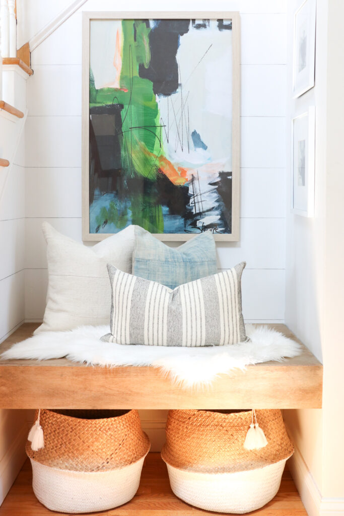 Modern Coastal Summer Nook With New Abstract Painting. Pillows from City Farmhouse and Co,