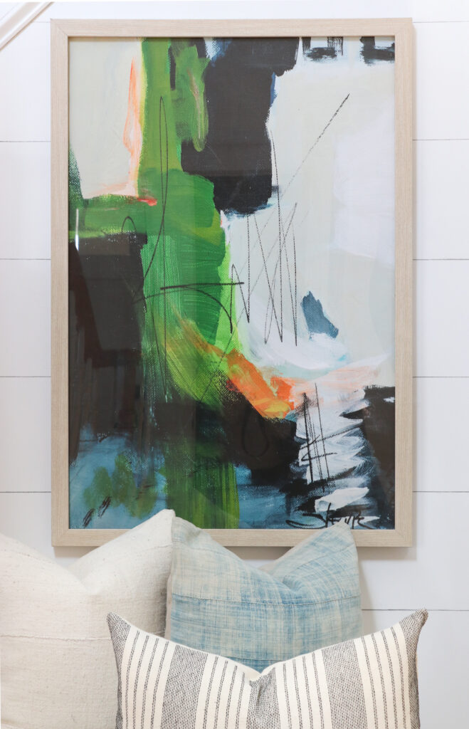 Modern Coastal Summer Nook With New Abstract Painting. Pillows from City Farmhouse and Co,