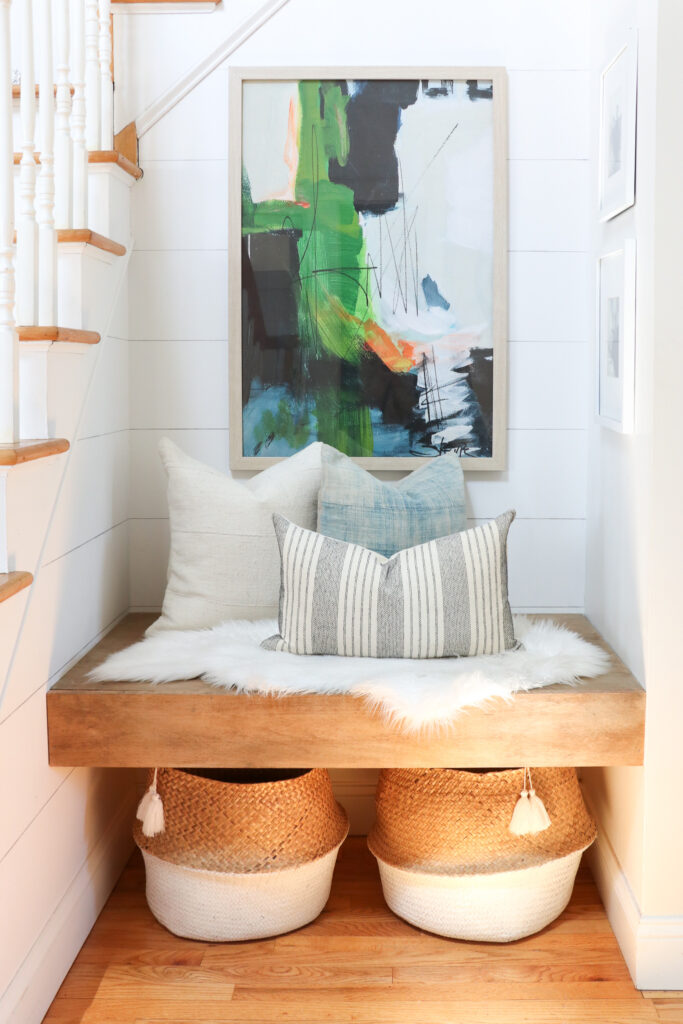 Modern Coastal Summer Nook With New Abstract Painting. Pillows from City Farmhouse and Co,