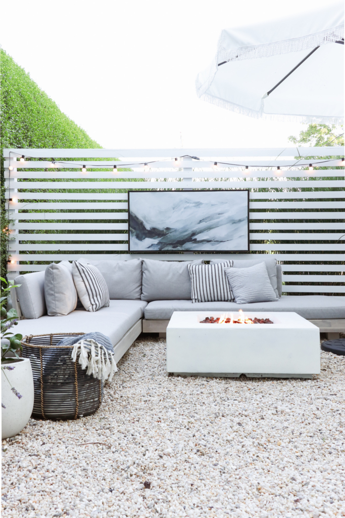 California Casual, Palm Springs Inspired Pea Gravel Patio. White Concrete Fire PIt.