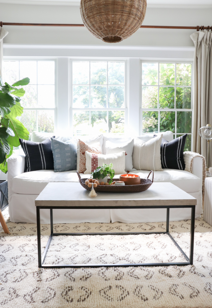 Cozy Fall Den + DIY Concrete Coffee Table. Simple how to make your own stone/plaster mixture. Cozy touches from Target.