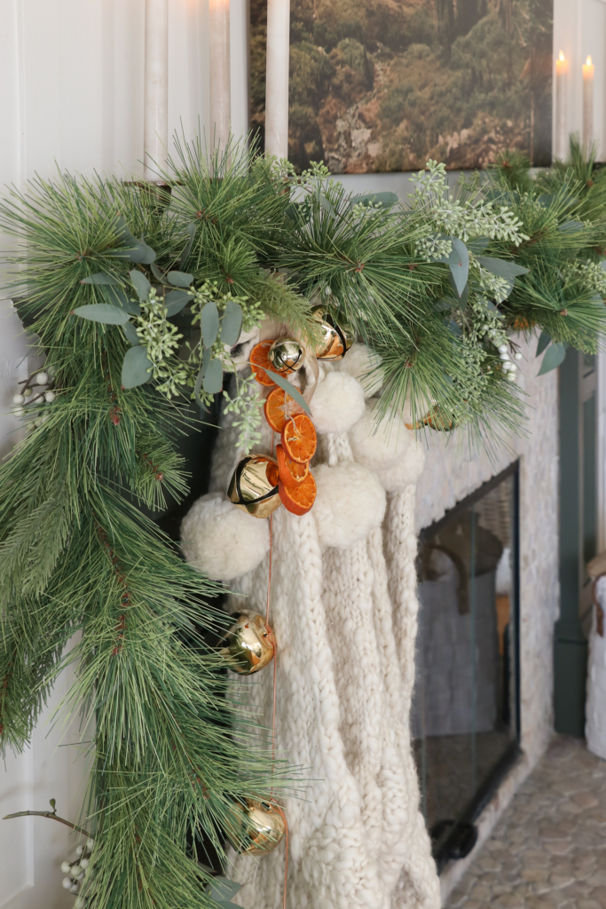 Aspen Inspired Christmas Mantle & Why It's My Favorite. How I took my husband's old picture of Aspen Mountain and had it printed onto a large canvas.