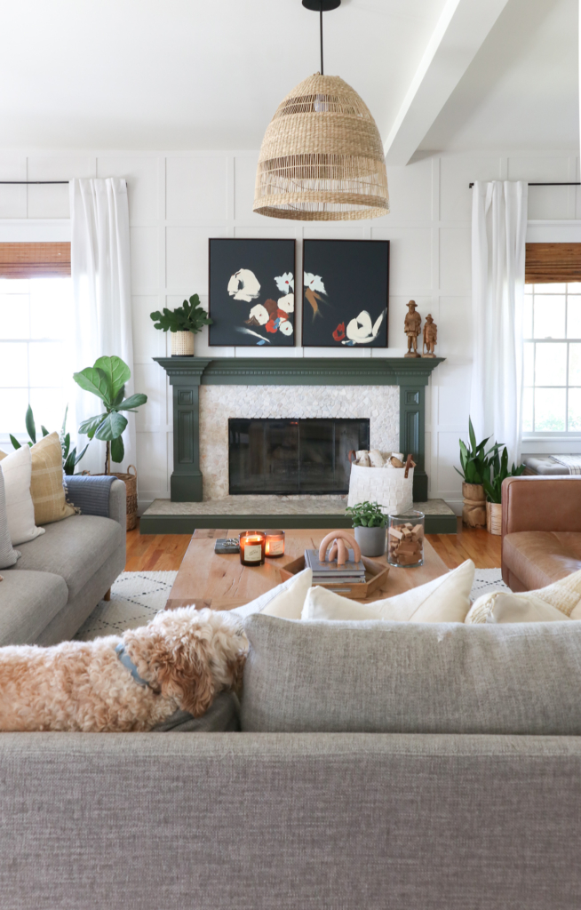 Cozy Family Room. Interior Define Sectional. Green Fireplace, Board and Batten. Woven DIY pendant.