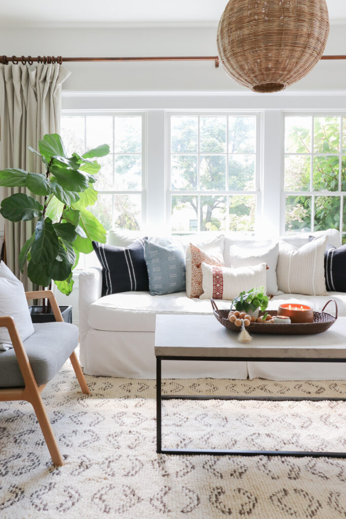 City Farmhouse by Jennifer OBrien Modern Coastal Home Tour. Black French Doors, Rattan Pendant Light.