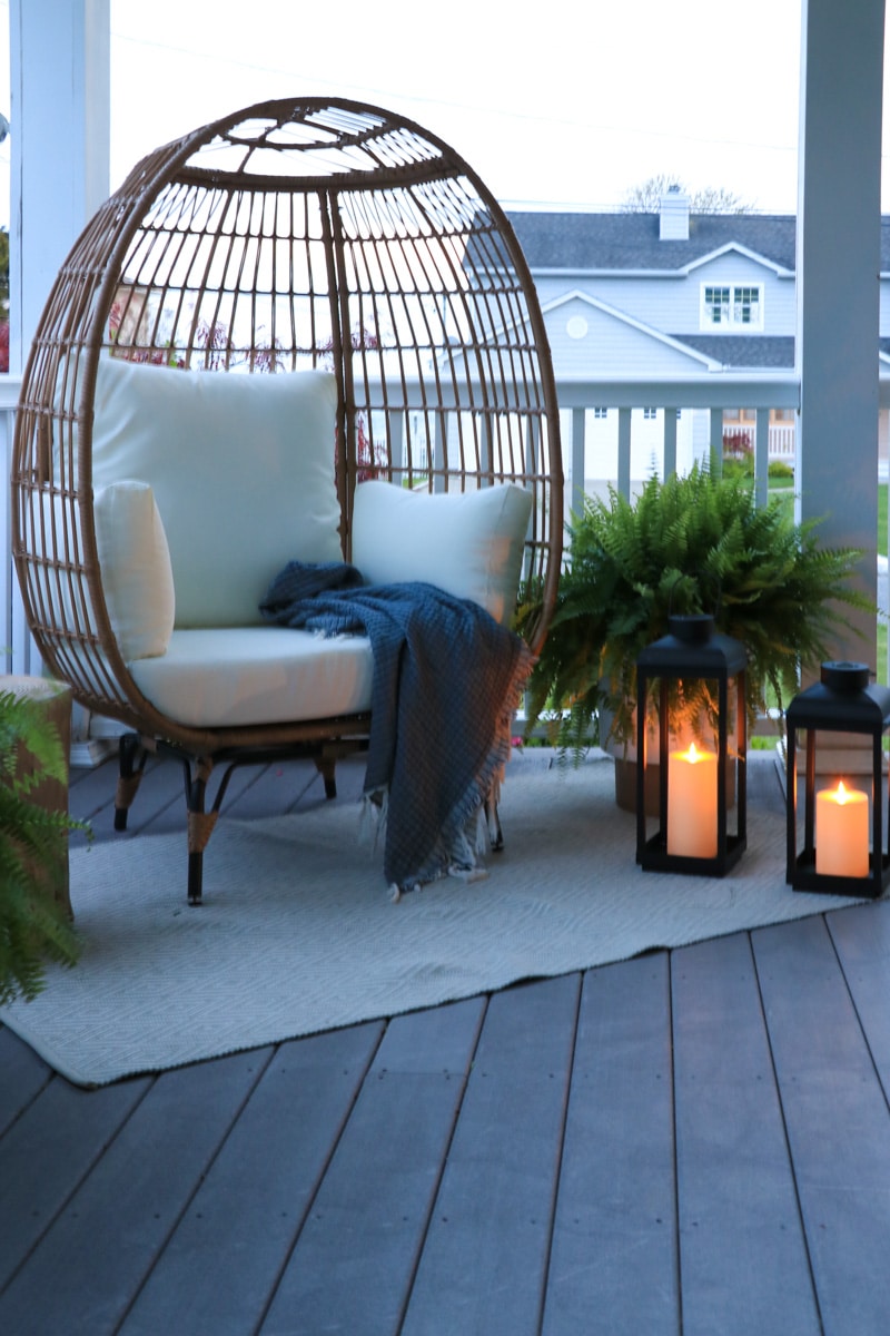 Farmhouse summer porch with new egg chair