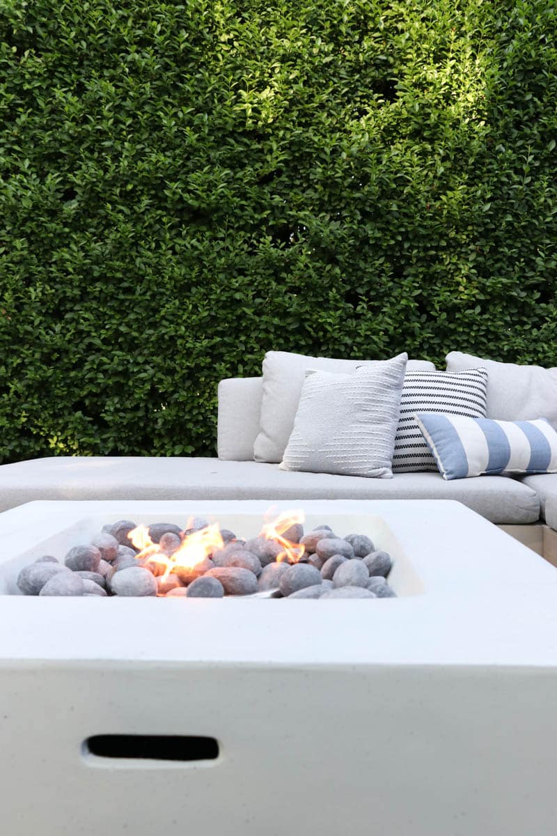 Backyard pea gravel patio. City Farmhouse by Jennifer O'Brien