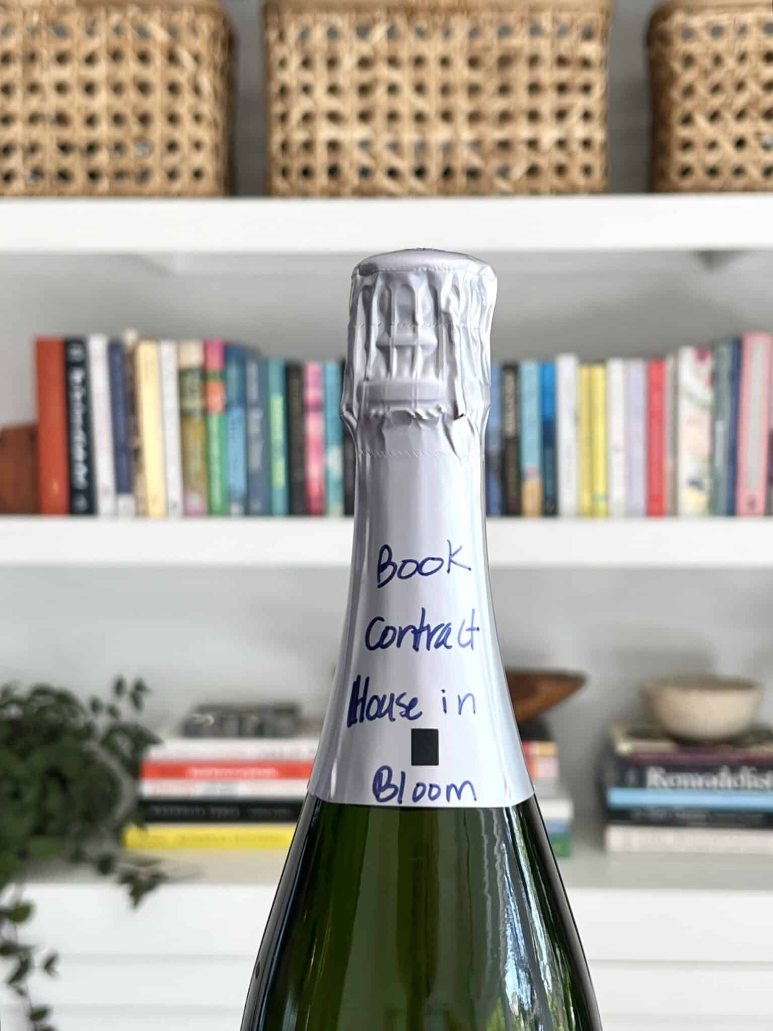  I Signed My First Book Contract. Jennifer O'Brien House in Bloom. I wrote this goal on a bottle of champagne.