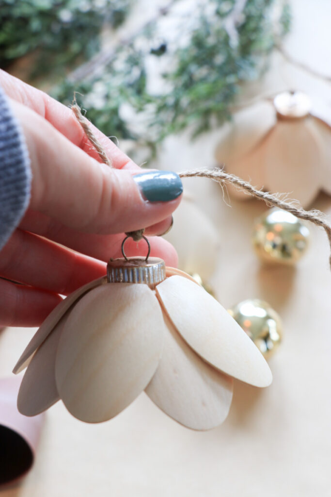 DIY Christmas bells for your mantel, wreath, staircase, or tree. These Lotus bells will be the most original bells of the season. 