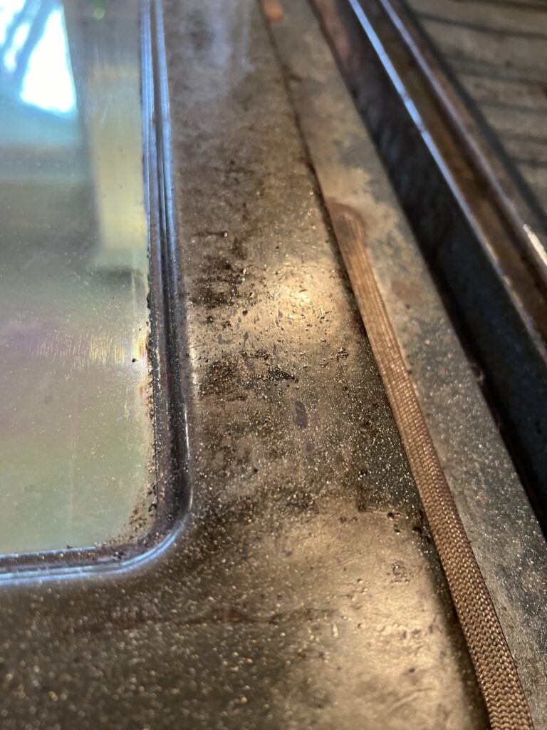 The BEFORE! The best all natural oven cleaning hack. Pumice cleaning stones work wonders on your oven. City Farmhouse by Jennifer O'Brien