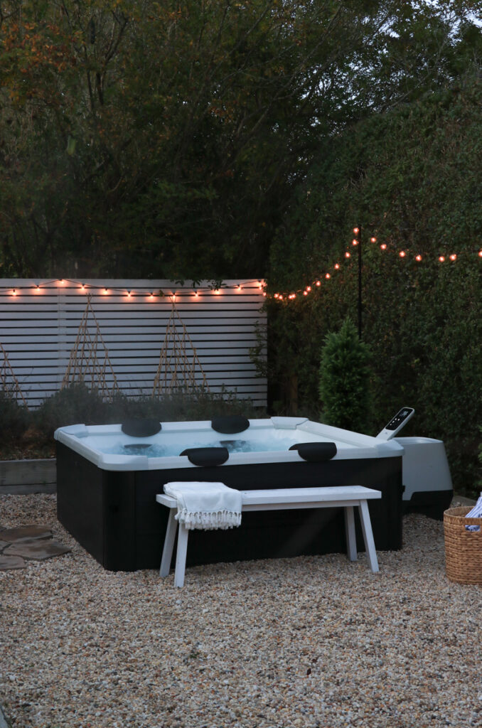 Coastal daughter holiday christmas walkway home. Jennifer O'Brien City Farmhouse. Mspa portable hot tub.